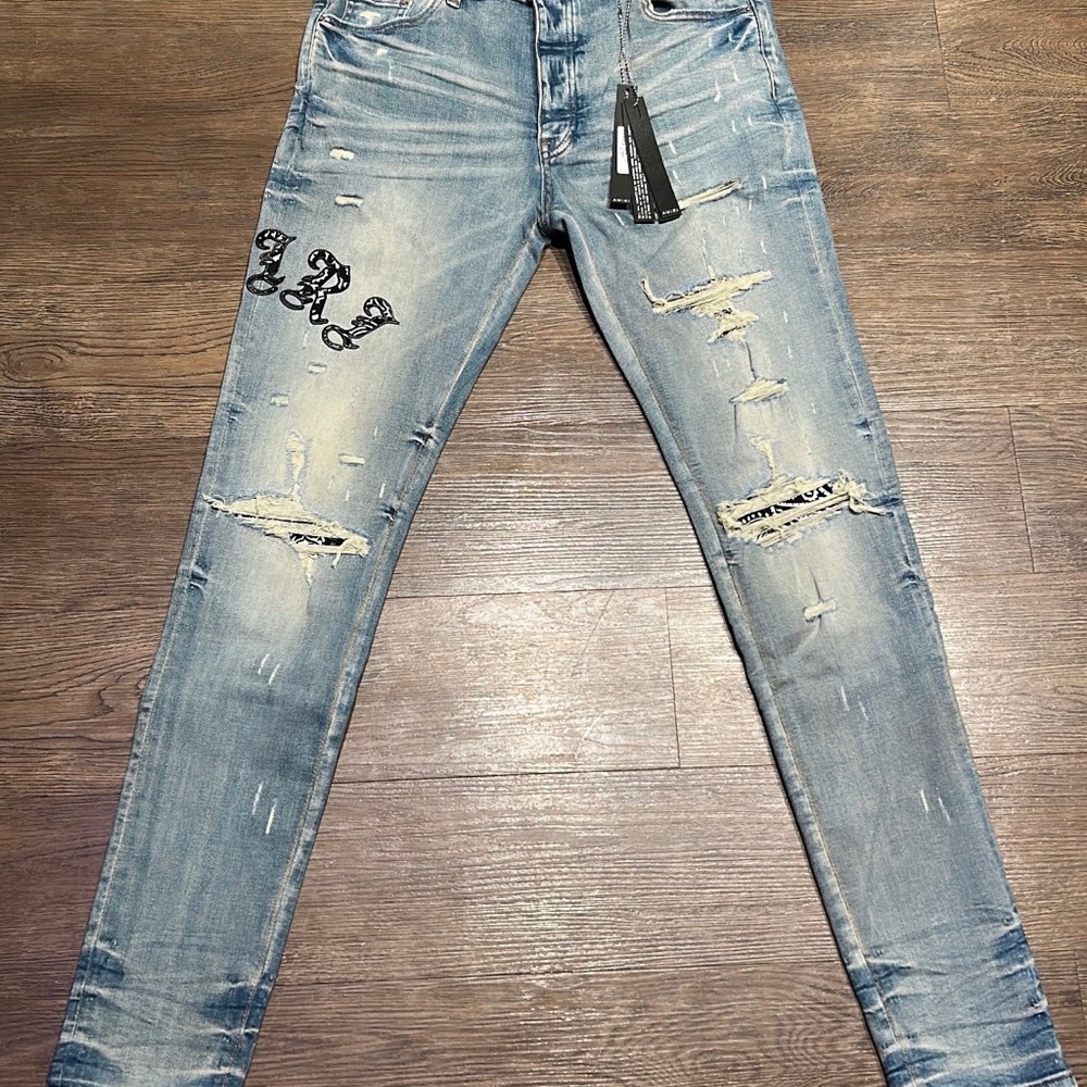 AMIRI Light Blue Distressed Skinny Jeans